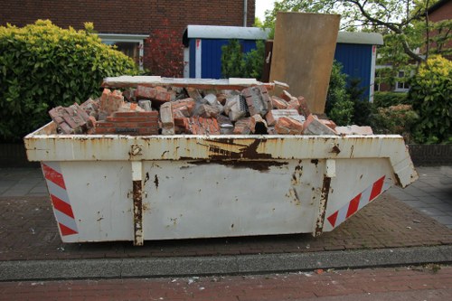 Residents disposing of old furniture in Willesden