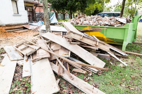 Team handling house clearance in a Willesden home